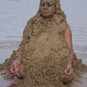 meditating at the beach